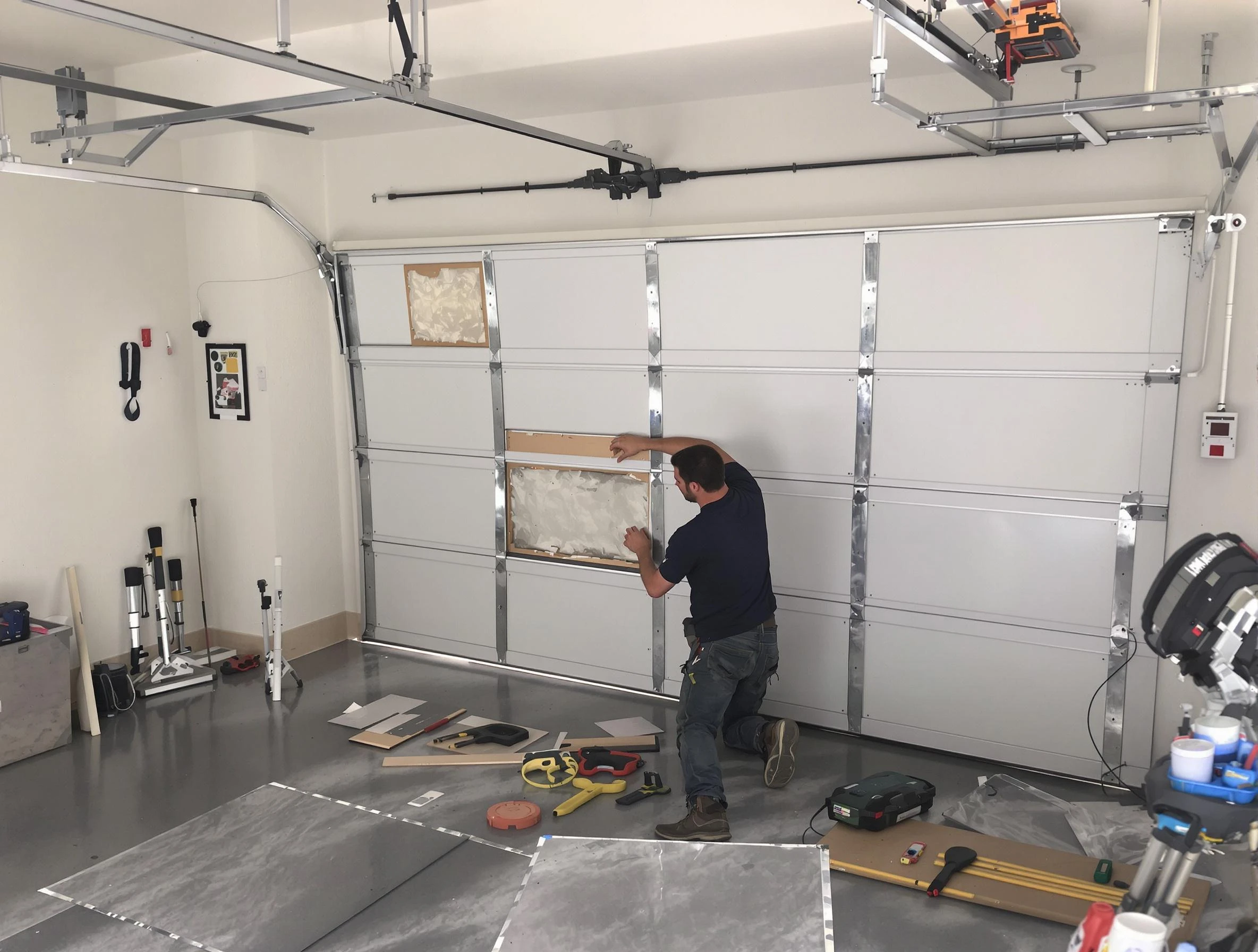 Garage Door Panel Repair in Los Chaves